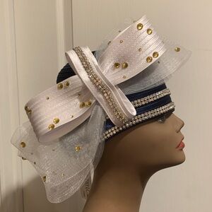 Elegant White and Navy Hat with Gold Accents